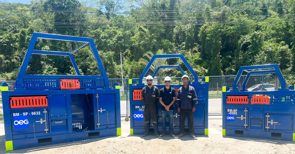 OEG operations team outside receiving their delivery of BlueManta spooling units.