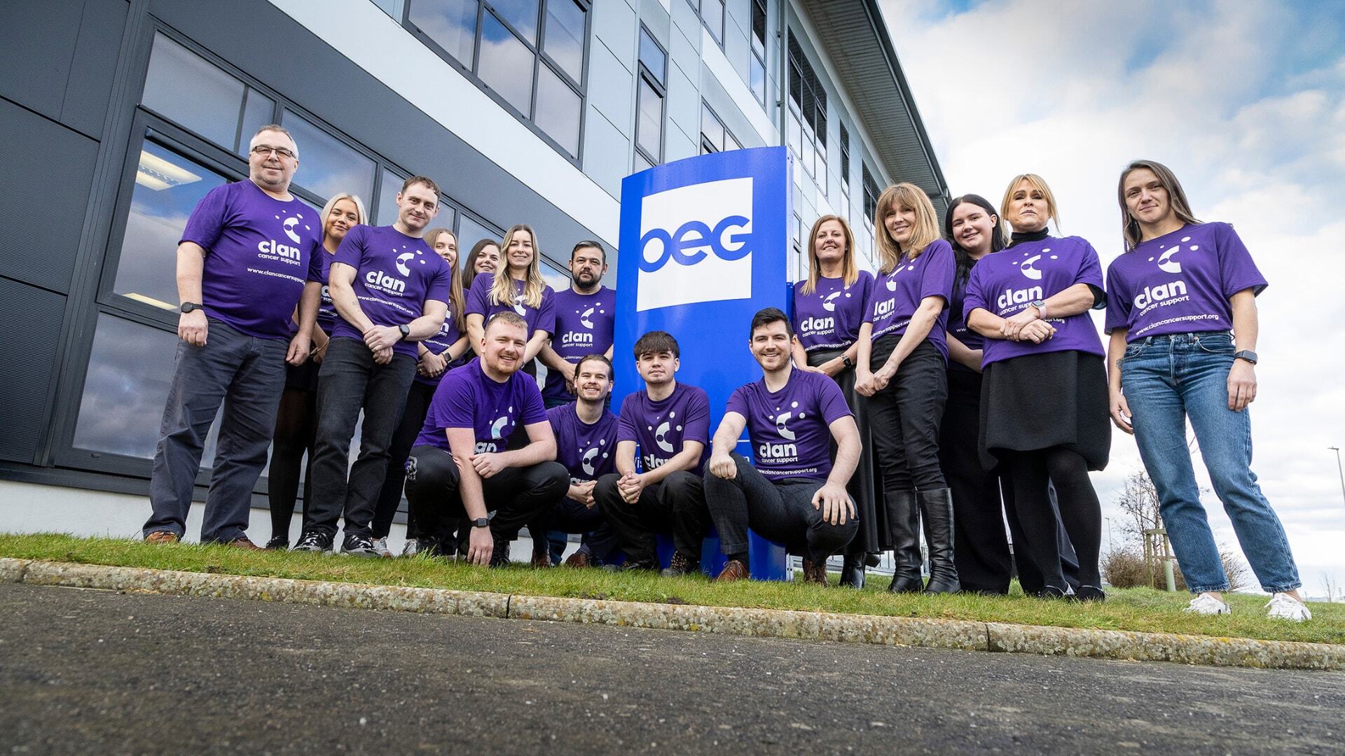 16 OEG Employees outside the Dyce, Aberdeen head office with CLAN Cancer Support charity T-shirts