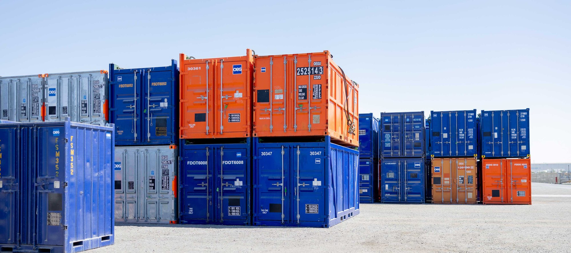 OEG DNV certified containers stacked in a yard