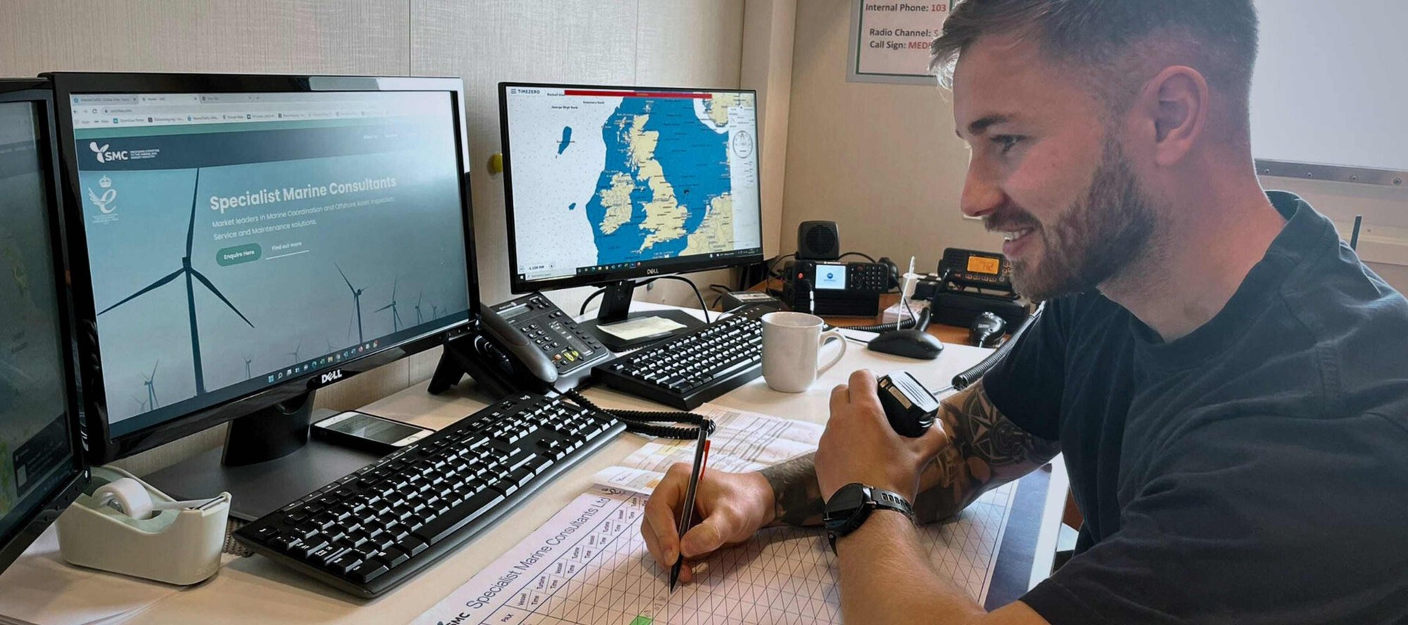 Marine coordination worker at desk