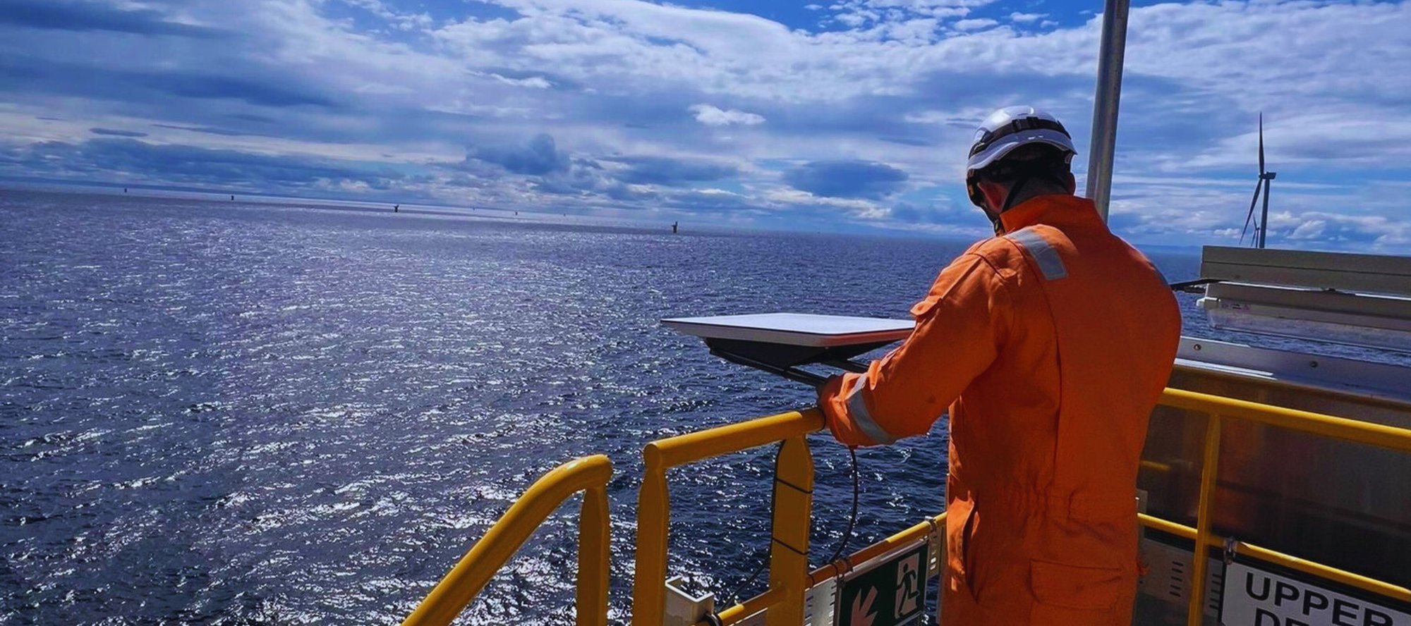 Offshore technology engineer looking out at sea